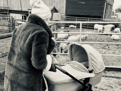 Claire Farrow with pram at a farm