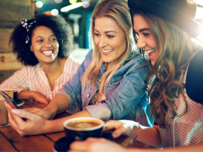 People drinking coffee and smiling