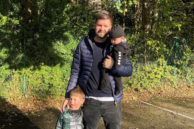 Our Head of Solutions Delivery, John Crichton, with his two young boys on an autumn day.